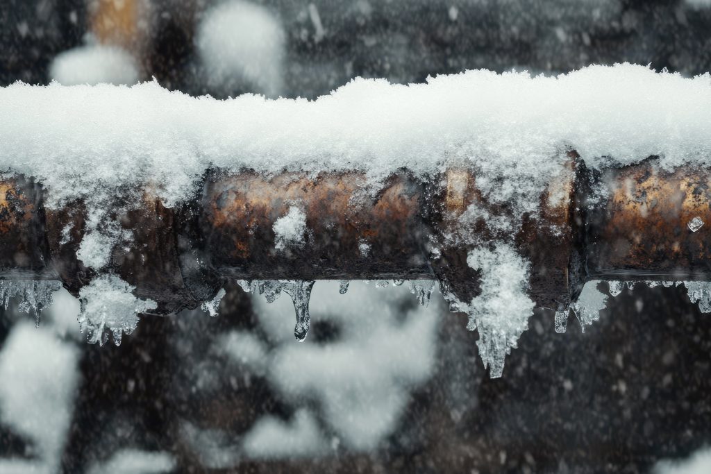 Plumber in St Thomas fixing frozen pipe
